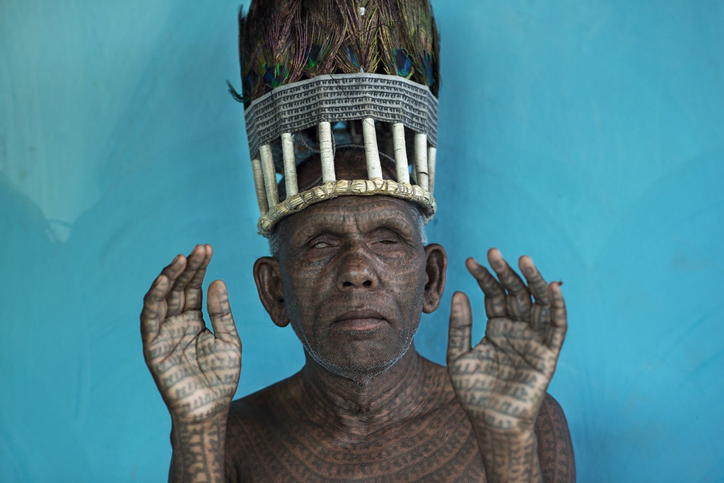 The chef of Ramnami people in Chhattisgarh,India. Ramnami tattoo the name of the lord ìRamî on their body. Their entire focus is on the name of Ram, the name of God that is most dear to them. The Ramnami Samaj is a sect of harijan (Untouchable) Ram. Formed in the 1890s, the sect has become a dominant force in the religious life of the area. The tattoo is the result of their devotion and also, a gift and an acknowledgement from Ram